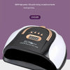A white and black UV/LED nail lamp device shown against a purple background.