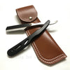 A brown leather sheath holds a black straight edge barber razor with a silver blade.