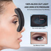 A close-up of a black 3D contoured eye mask designed to allow eyes free blinking and protect makeup.