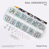 Kit de uñas con adornos de diamante iridiscente y diamantes sueltos.