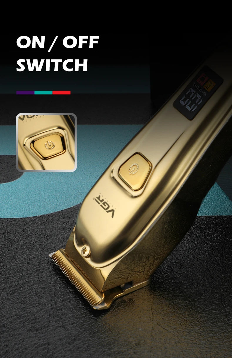 Close-up of a gold-colored electric hair clipper trimmer with an on/off switch visible.