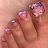A close-up photo of a hand displaying press-on fake nails with a floral and leopard print design.