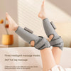 A person's leg is shown wearing a gray silicone massage sleeve for full leg massage.