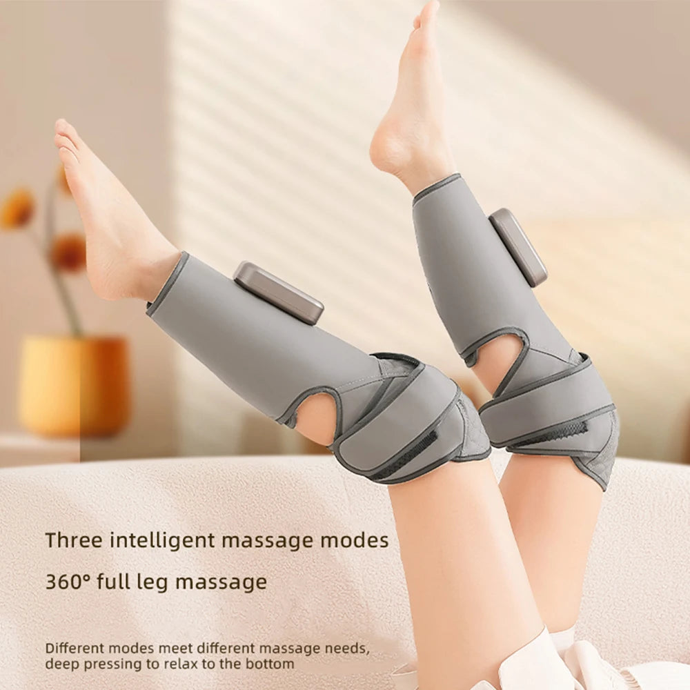 A person's leg is shown wearing a gray silicone massage sleeve for full leg massage.