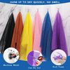 Colorful reusable African net body exfoliator sponges hanging to dry