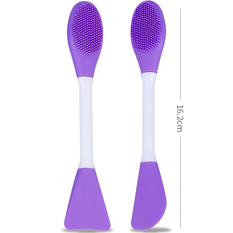 A purple silicone facial brush set with white handles and exfoliating bristles.