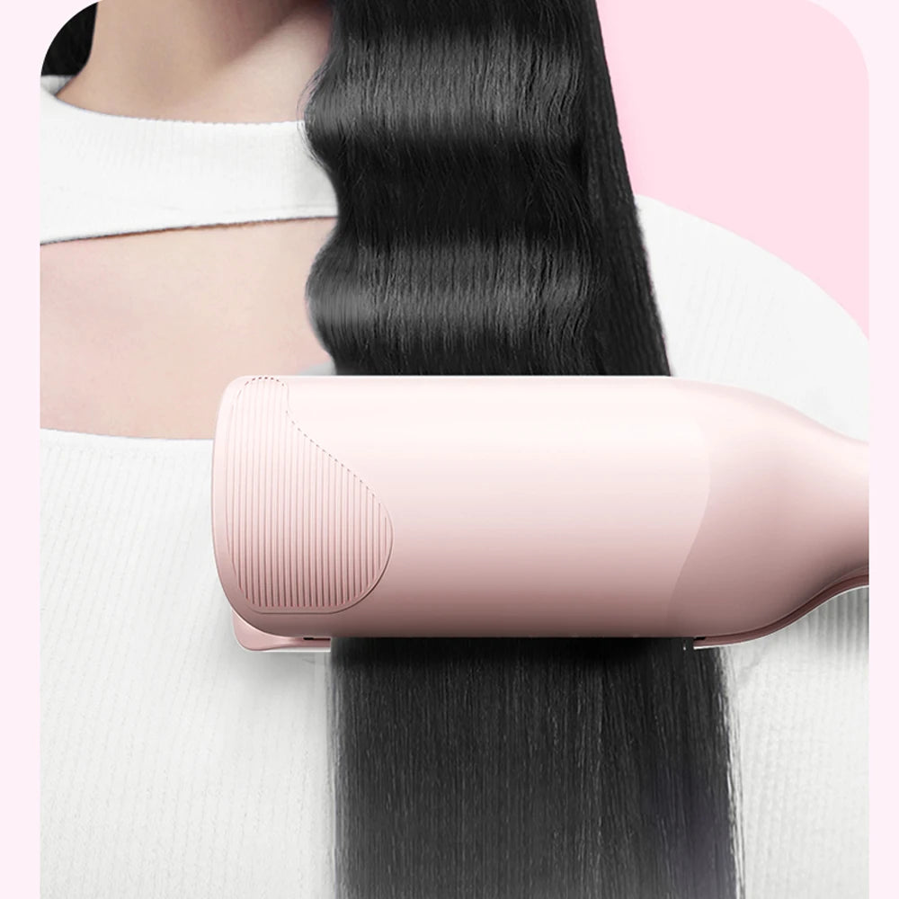 A pink professional double barrel curling iron is shown holding a long, dark hair strand.