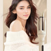 A woman models an automatic ceramic hair curler with negative ions, showing the device and a knitted sweater.