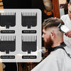 A man is using a professional rechargeable hair clipper trimmer on another man's haircut.