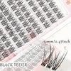 A close-up view of black teier eyelash extensions laid out on a white surface, showing the individual lashes and size measure