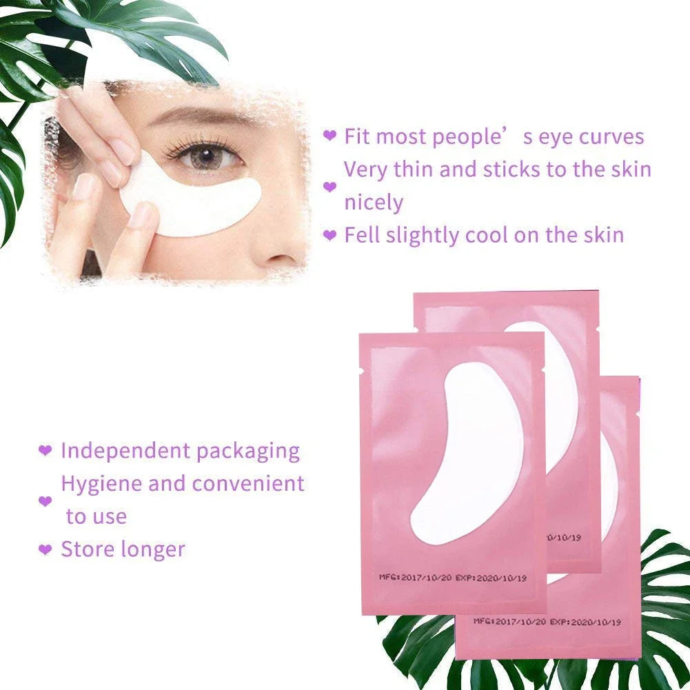 Close-up of a person applying under-eye lash application patches to their eye, showing the product's use and texture.