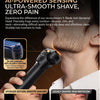 A close-up of a black electric shaver being used on a man's jawline, highlighting its design features.