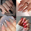 A collection of press-on false nails featuring various glitter, metallic, and French wavy designs on fingernails.
