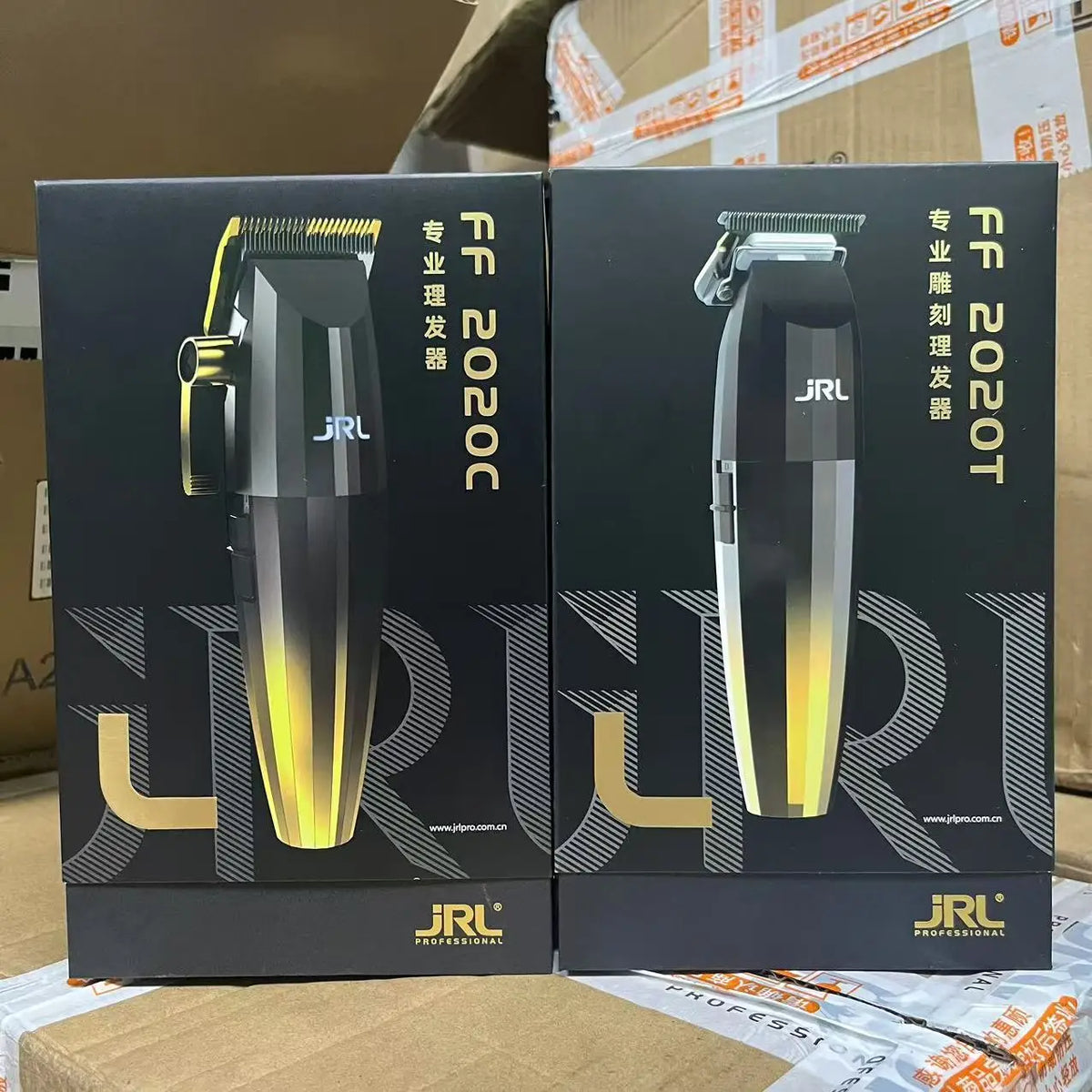 A pair of black JRL FF 2020C and FF 2020T professional electric hair trimmer kits in their original packaging.