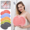 Eine Sammlung von Silikon-Fußpeel- und Massagebürsten in verschiedenen Farben, darunter rosa, orange, blau, grün und grau