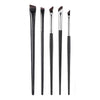 A set of professional angled makeup brushes with varying sizes and shapes.