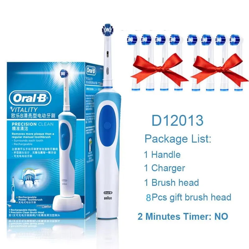A white Oral-B vitality electric toothbrush and replacement brush heads are shown in a box.