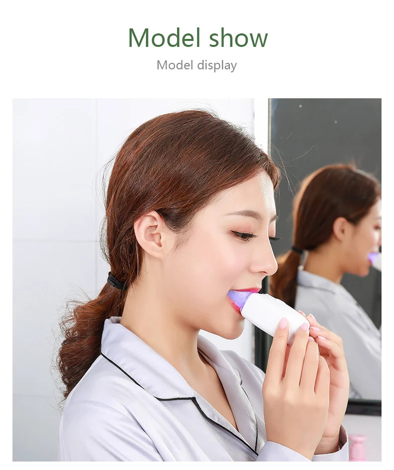 A woman is using a white electric toothbrush for oral care in a model display setting.
