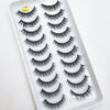 A tray of natural 3D mink false eyelashes displayed for sale.
