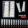 Un set de 11 tips à ongles en acrylique transparents de différentes longueurs et courbes, présentés dans une boîte en plastiq