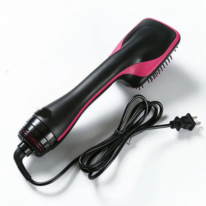 A black and pink professional ceramic hot air brush hair styling tool with a cord.