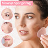 A makeup sponge puff is shown being used for multi-angle makeup application on a woman's face.