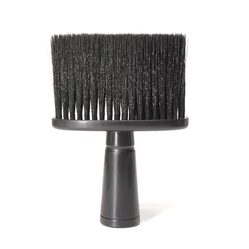A black soft bristle hair duster brush used for salon and barbershop work.