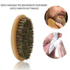 A wooden boar bristle beard brush and comb set shown with a close-up of the bristles and a person using it on their beard.