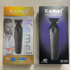 A black Kemei professional hair clipper is shown in its packaging box.