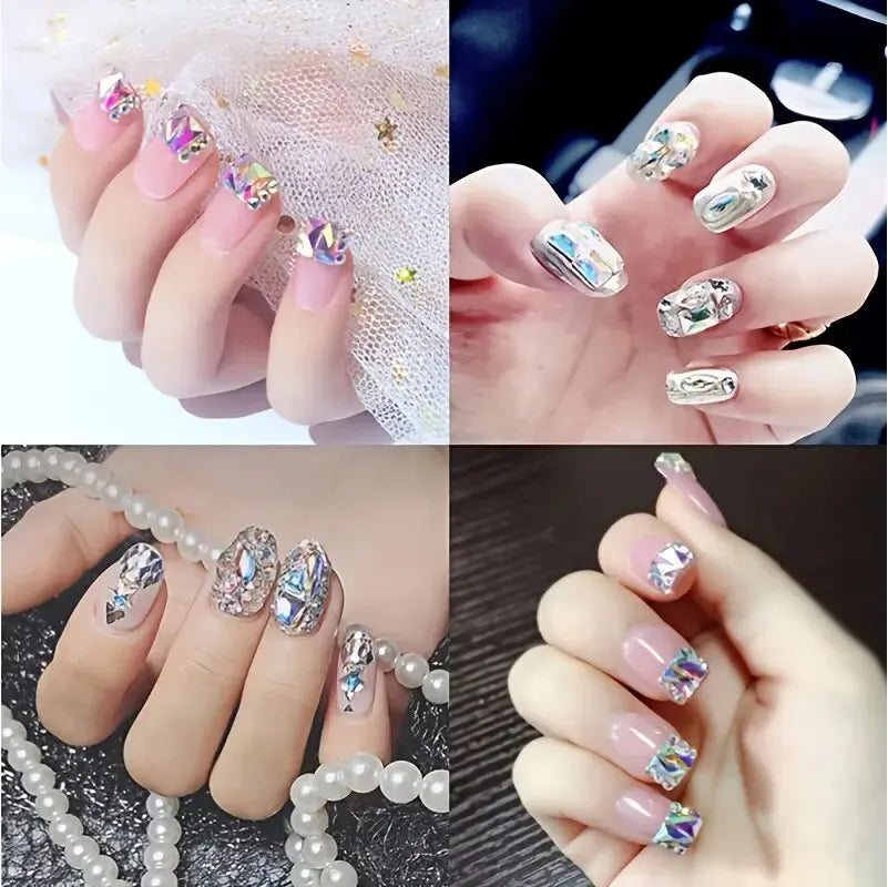 A hand displays various mixed glass rhinestones and nail art designs on fingernails.
