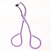 A purple stainless steel wide-angle eyelash curler tool.