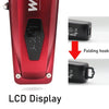 Close-up view of a red electric hair clipper showing an LCD display and a folding hook attachment.