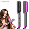 A woman is using a professional electric hair straightener comb with black and purple accents on her hair.