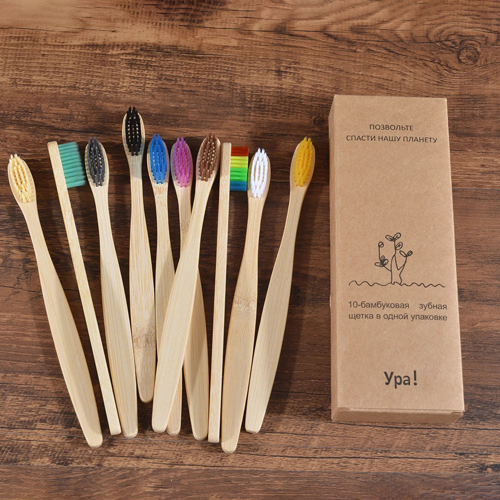 A set of ten natural bamboo toothbrushes packaged in a cardboard box.