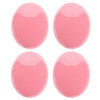 Four pink silicone facial cleansing brushes with textured surfaces for deep pore exfoliation