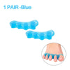 One pair of blue silicone toe separators shown next to a foot for bunion relief.