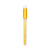 A clear glass bottle with a gold cap and an applicator brush filled with synthetic eyelashes for cleaning.
