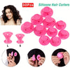 A set of 30 silicone pink hair curlers in various sizes L and S for heatless curling.
