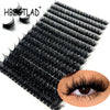 A tray of black mixed false eyelashes displayed next to an eye for natural enhancement.