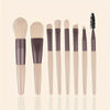 A set of complete makeup brushes featuring soft synthetic bristles in various sizes and shades.