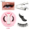 A set of magnetic mink false eyelashes, including a pair on an eye and loose lashes.