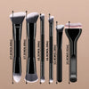 A set of six dual-ended makeup brushes with varying sizes shown against a neutral background.