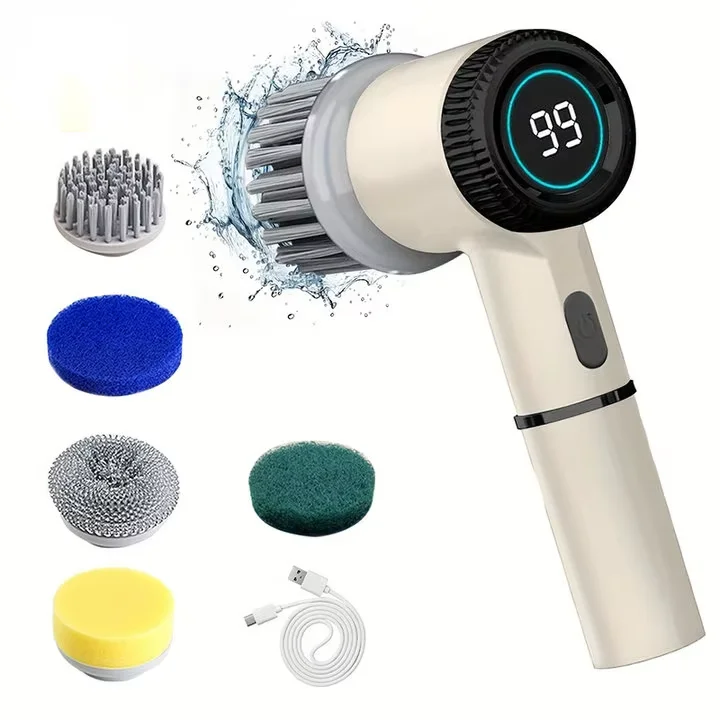 A beige electric spin scrubber with a circular brush head and various replacement brush heads shown next to the device.