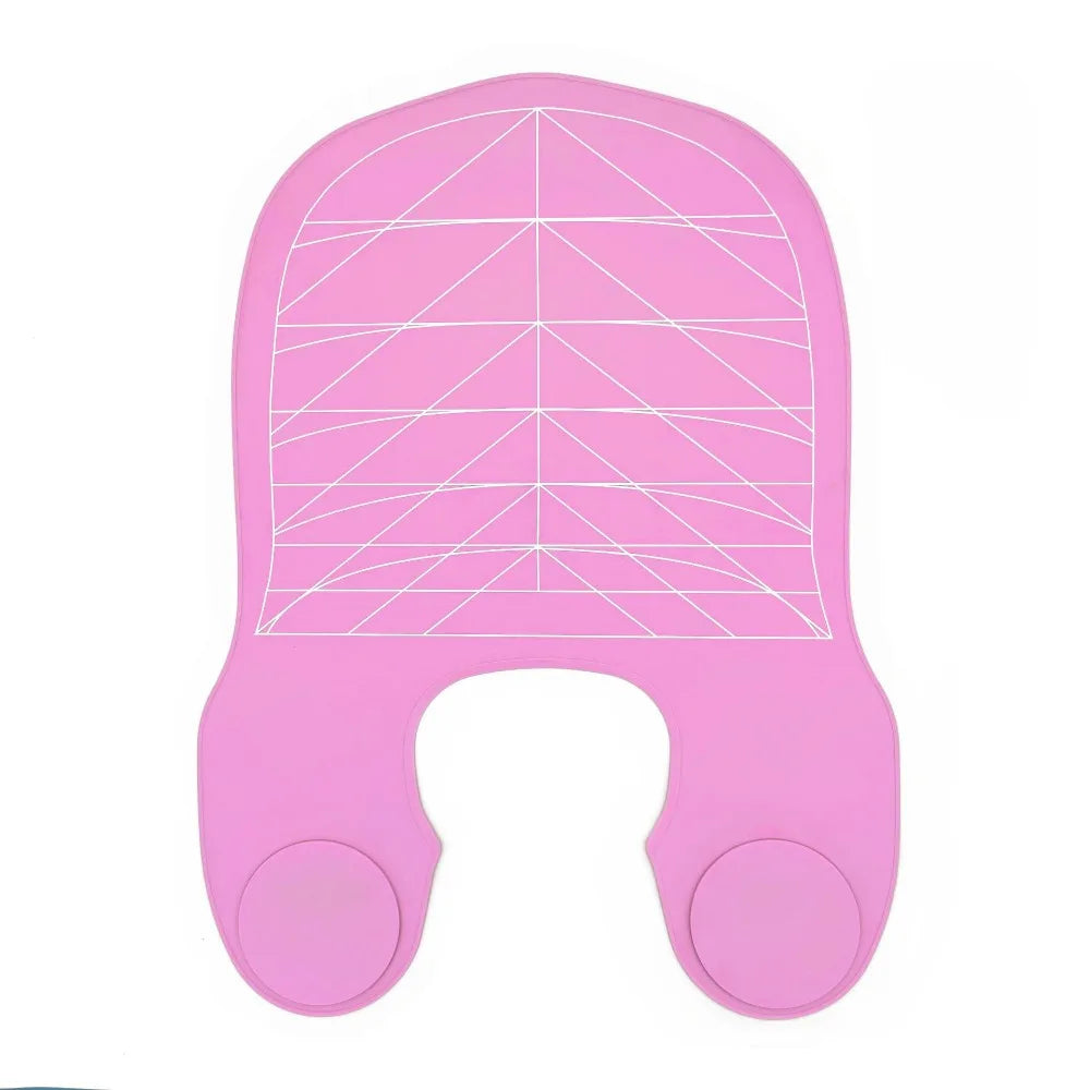 A pink reusable silicone hair dyeing cape with a cutting collar.