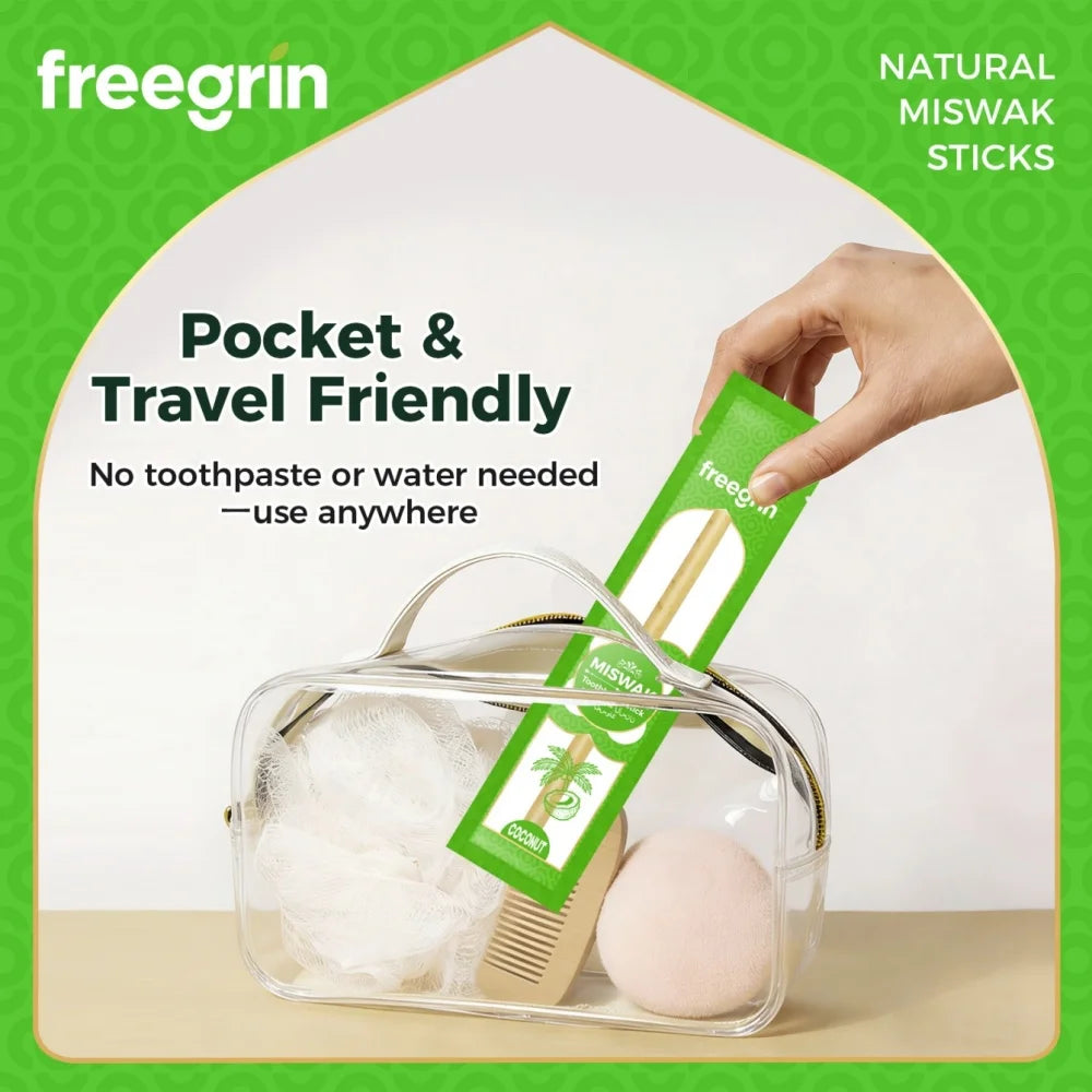 A hand is shown taking a natural miswak toothbrush stick from a clear travel case.