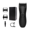 A black professional body and personal hair trimmer with a textured grip and detachable blade.