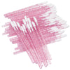 A collection of pink and white crystal lip brushes and lash spoolies arranged in a fan shape.