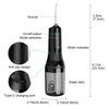 A black portable electric dental floss and oral irrigator device showing its components like the nozzle, button, indicator, a