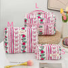 A set of pink and green striped quilted cotton makeup bags, including a zippered pouch and a larger box style bag.