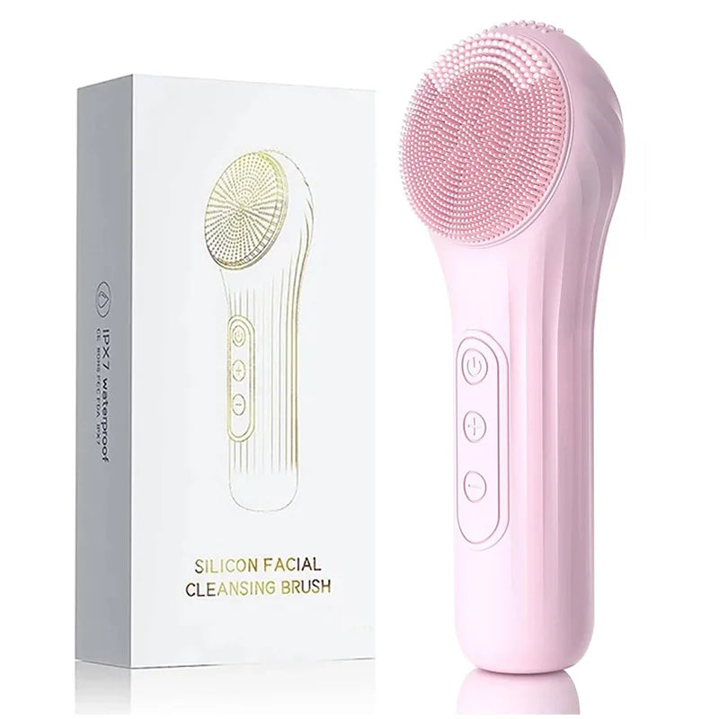 A pink silicone facial cleansing brush is shown next to its packaging box.